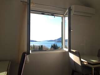 Апартаменты Apartments TMV Dragovic Свети-Стефан Улучшенные апартаменты с балконом и видом на море-10